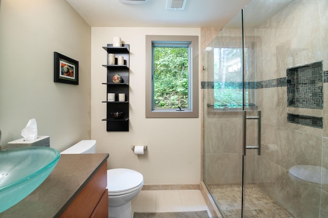 N7775 920th St, River Falls, WI 54022 - bathroom featuring tile patterned flooring, vanity, and a stall shower