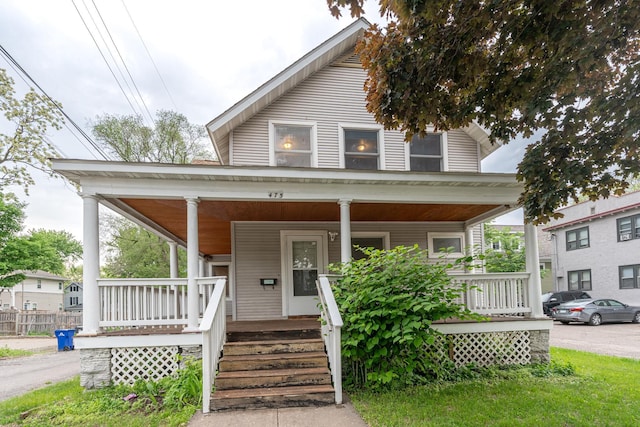 475 Minnehaha Ave E, Saint Paul, MN 55130 - country-style home featuring a porch