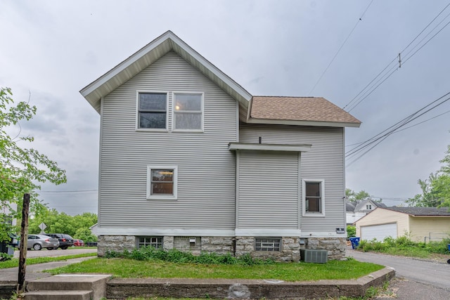 475 Minnehaha Ave E, Saint Paul, MN 55130 - view of property exterior with central AC unit and an outbuilding