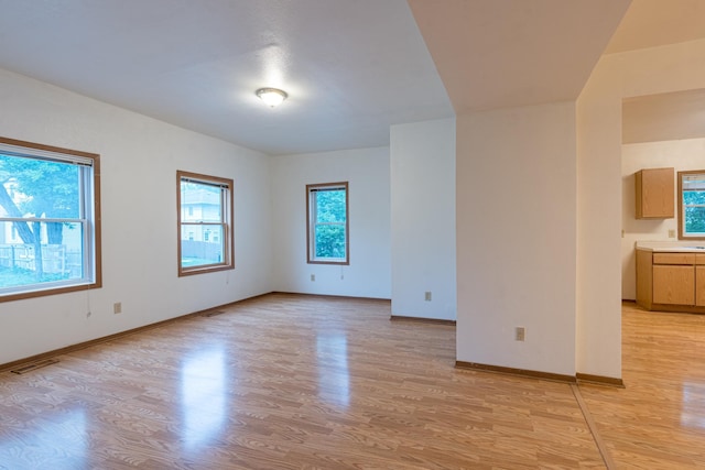 475 Minnehaha Ave E, Saint Paul, MN 55130 - empty room featuring light wood finished floors and baseboards