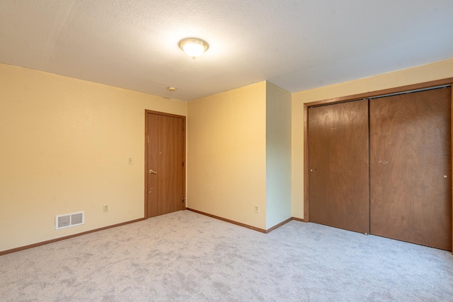 475 Minnehaha Ave E, Saint Paul, MN 55130 - unfurnished bedroom with carpet, a closet, and baseboards