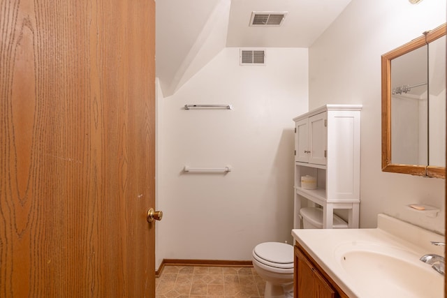 475 Minnehaha Ave E, Saint Paul, MN 55130 - bathroom featuring toilet, vanity, and baseboards
