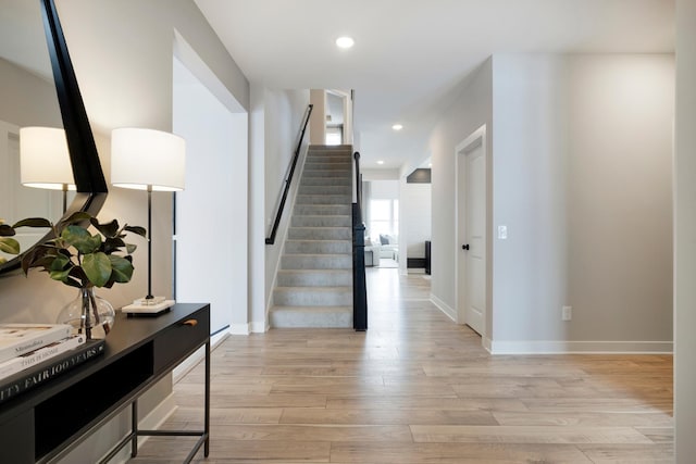 14705 105th Pl N, Maple Grove, MN 55369 - staircase featuring wood finished floors, baseboards, and recessed lighting