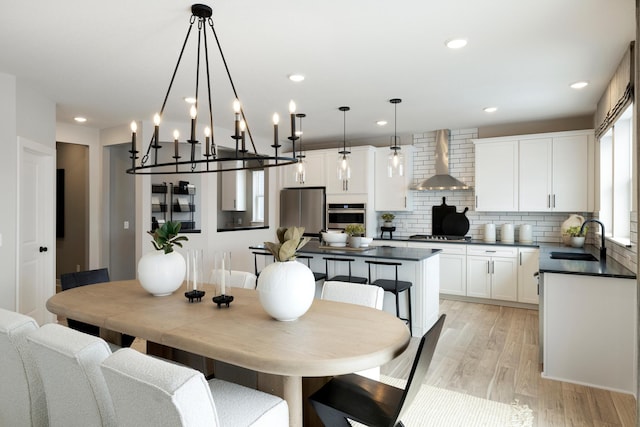 14705 105th Pl N, Maple Grove, MN 55369 - dining space with light wood finished floors, recessed lighting, and a chandelier