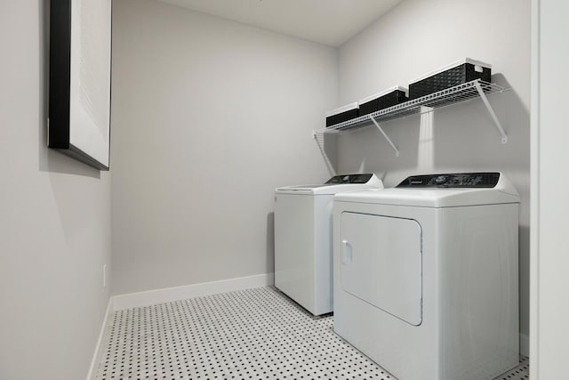14705 105th Pl N, Maple Grove, MN 55369 - washroom with independent washer and dryer, baseboards, and light flooring