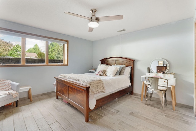 2800 9th Ave SW, Austin, MN 55912 - bedroom featuring light wood finished floors, baseboards, and a ceiling fan