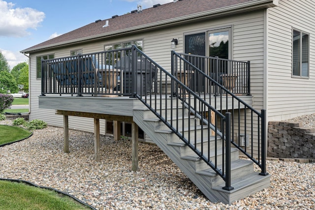 2800 9th Ave SW, Austin, MN 55912 - back of house with a wooden deck and stairway