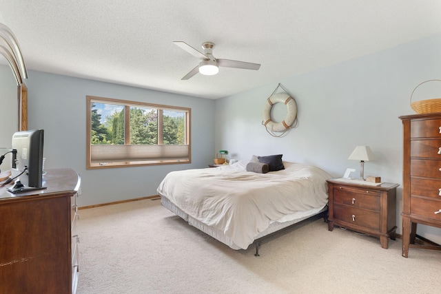 2800 9th Ave SW, Austin, MN 55912 - bedroom with light colored carpet, a ceiling fan, and baseboards