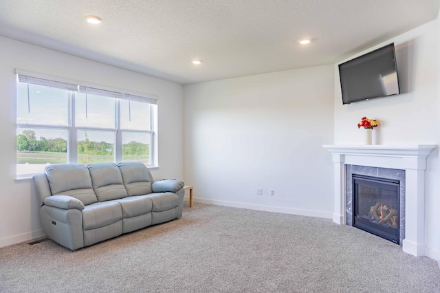 830 Foxglove Ter, Waconia, MN 55387 - carpeted living area featuring a fireplace, baseboards, and recessed lighting
