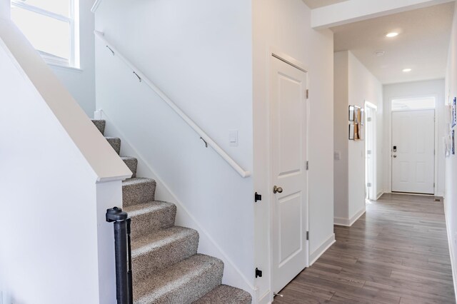 830 Foxglove Ter, Waconia, MN 55387 - staircase featuring wood finished floors, recessed lighting, and baseboards