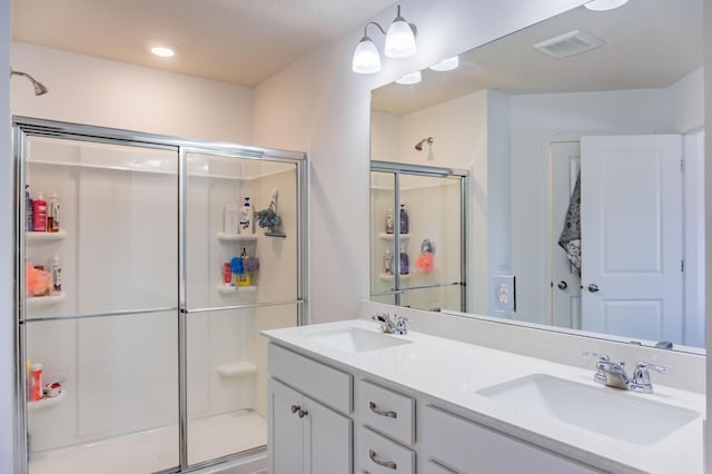 830 Foxglove Ter, Waconia, MN 55387 - bathroom featuring a stall shower and double vanity