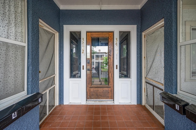 3400 Elliot Ave S, Minneapolis, MN 55407 - entrance to property with stucco siding and a porch