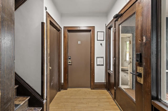 3400 Elliot Ave S, Minneapolis, MN 55407 - corridor featuring light wood-style floors