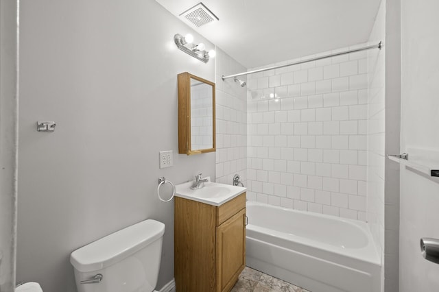 3400 Elliot Ave S, Minneapolis, MN 55407 - bathroom featuring toilet, vanity, and shower / bathtub combination