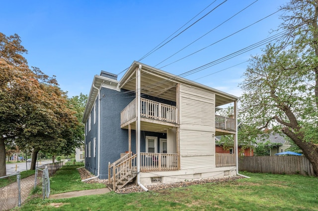 3400 Elliot Ave S, Minneapolis, MN 55407 - back of house featuring a balcony