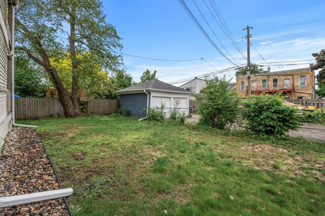 3400 Elliot Ave S, Minneapolis, MN 55407 - view of yard with a garage and an outbuilding