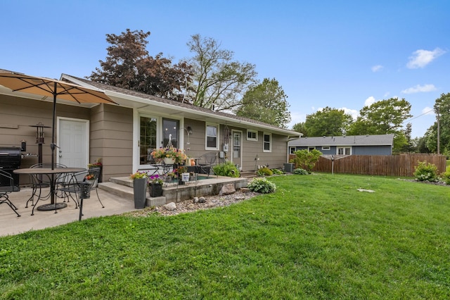 72 7th St, Cochrane, WI 54622 - back of house featuring a patio area
