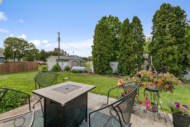 72 7th St, Cochrane, WI 54622 - view of patio with a shed and outdoor dining area