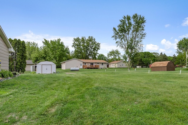 72 7th St, Cochrane, WI 54622 - view of green lawn featuring a storage shed
