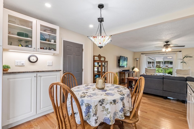 72 7th St, Cochrane, WI 54622 - dining space with light wood finished floors, ceiling fan, and recessed lighting