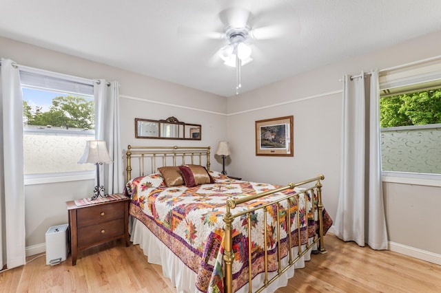 72 7th St, Cochrane, WI 54622 - bedroom featuring light wood-type flooring and ceiling fan