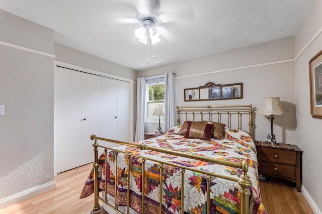 72 7th St, Cochrane, WI 54622 - bedroom with light wood-style flooring, a closet, and ceiling fan