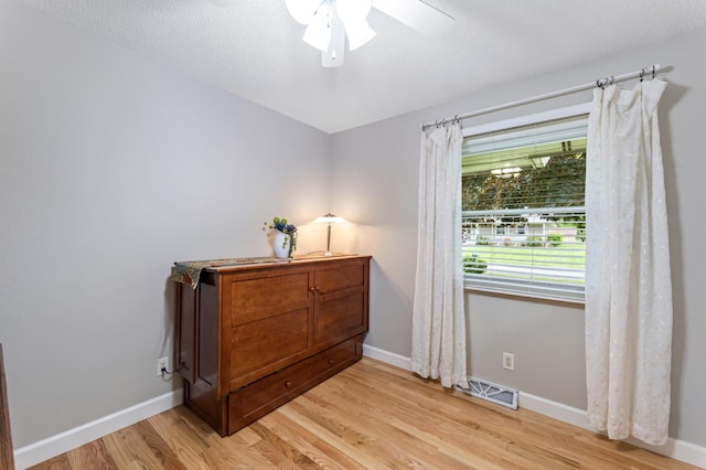 72 7th St, Cochrane, WI 54622 - bedroom featuring light wood-style floors and ceiling fan