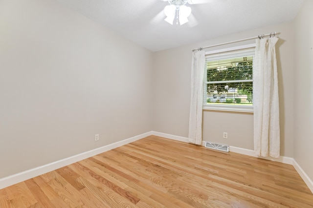 72 7th St, Cochrane, WI 54622 - empty room featuring light wood-style floors and ceiling fan