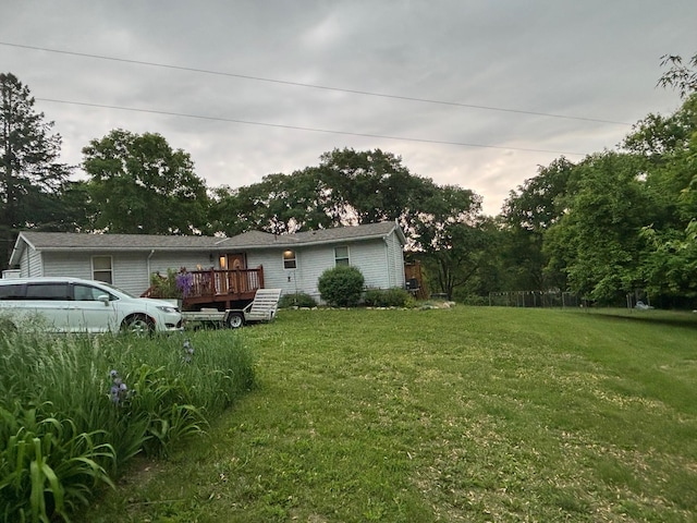19146 Eaglewood Rd, Lynden Twp, MN 55320 - view of grassy yard with a wooden deck