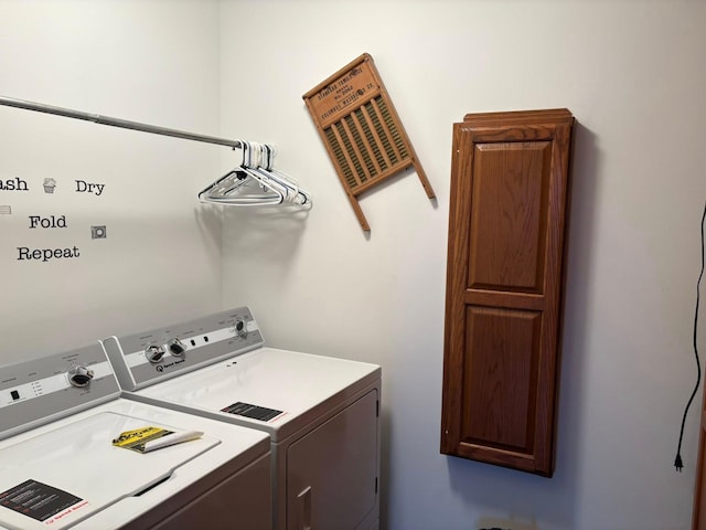 1108 11th Ave SE, Waseca, MN 56093 - washroom with cabinet space and washer and dryer