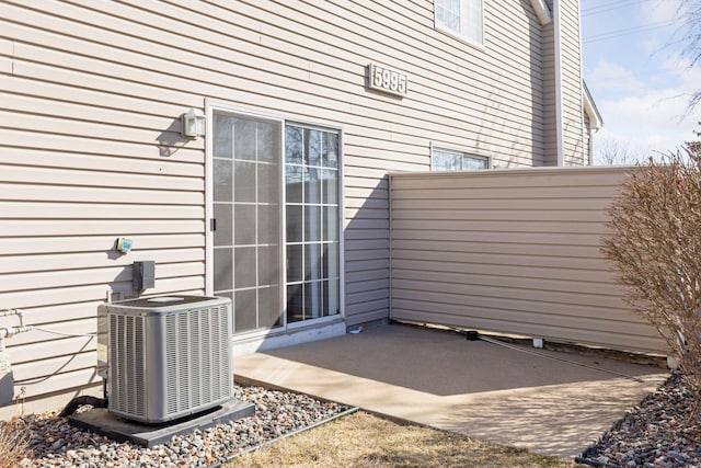 5995 Wedgewood Ln N Unit 84, Plymouth, MN 55446 - view of patio / terrace featuring central air condition unit