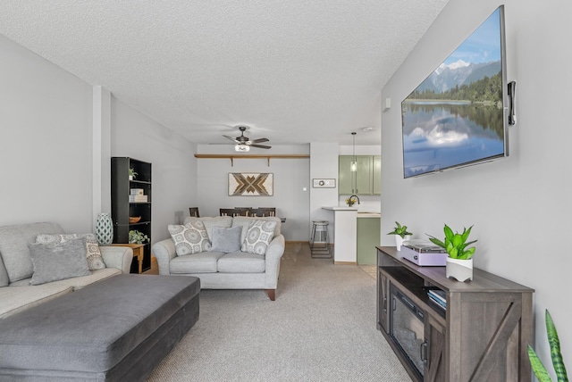 803 Willow Glen Ct, Buffalo, MN 55313 - living area featuring light colored carpet, a ceiling fan, and a textured ceiling