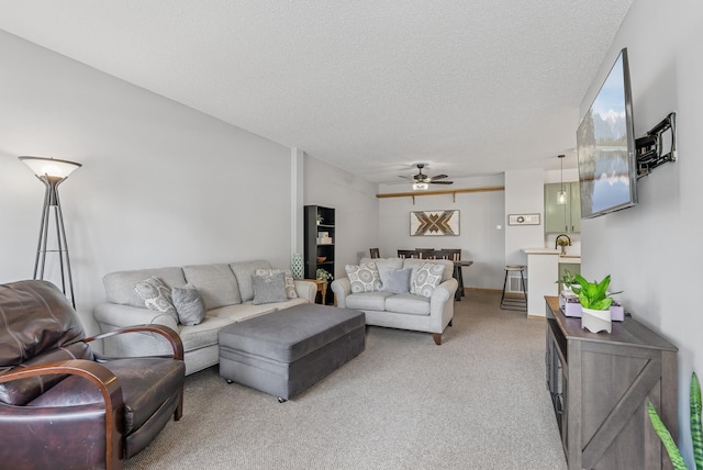 803 Willow Glen Ct, Buffalo, MN 55313 - living room featuring a ceiling fan, light colored carpet, and a textured ceiling