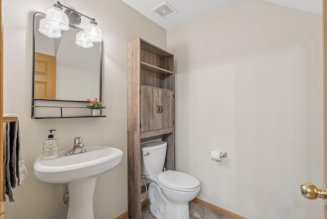 803 Willow Glen Ct, Buffalo, MN 55313 - half bathroom featuring toilet and tile patterned floors