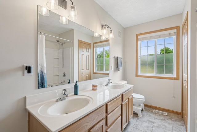 803 Willow Glen Ct, Buffalo, MN 55313 - full bath with double vanity and tile patterned floors