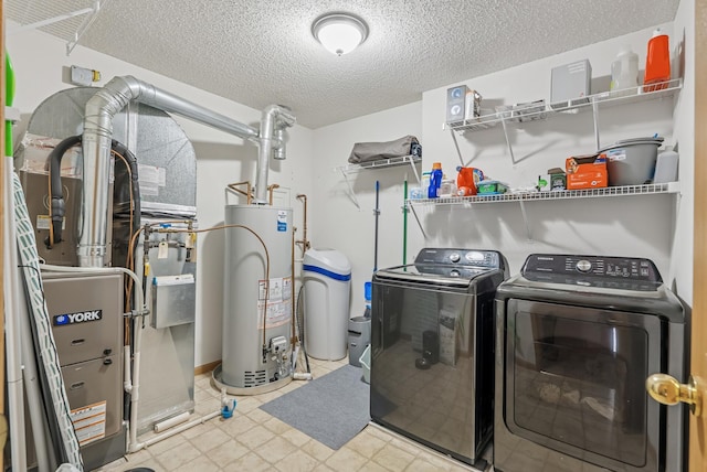803 Willow Glen Ct, Buffalo, MN 55313 - laundry area with water heater, separate washer and dryer, a textured ceiling, and heating unit