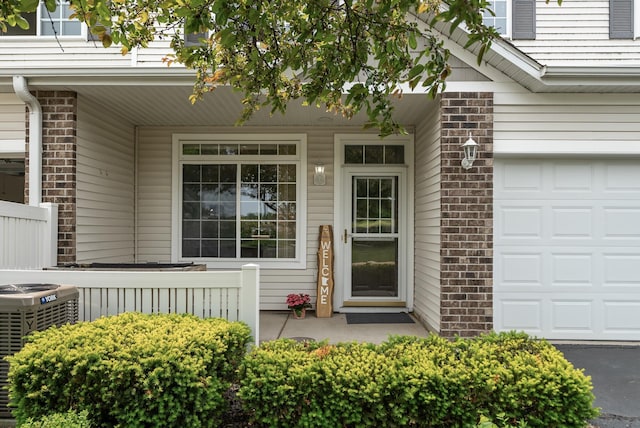803 Willow Glen Ct, Buffalo, MN 55313 - property entrance featuring covered porch and brick siding