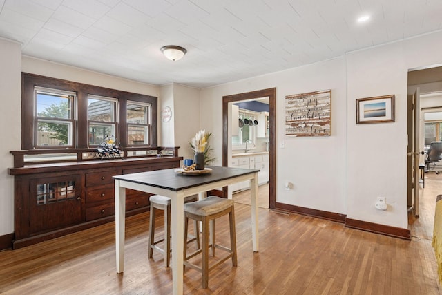 1104 21st Ave SE, Minneapolis, MN 55414 - dining area featuring plenty of natural light and light wood-type flooring