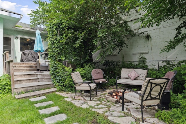 1104 21st Ave SE, Minneapolis, MN 55414 - view of yard featuring an outdoor fire pit and a patio