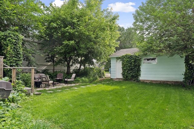 1104 21st Ave SE, Minneapolis, MN 55414 - view of grassy yard featuring an outdoor structure