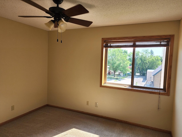520 5th St SW Unit 318, Willmar, MN 56201 - carpeted empty room with baseboards and ceiling fan