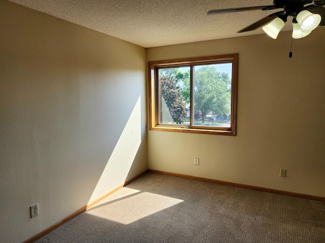 520 5th St SW Unit 318, Willmar, MN 56201 - unfurnished room with light colored carpet, a ceiling fan, baseboards, and a textured ceiling