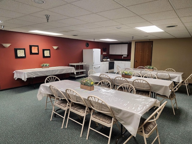 520 5th St SW Unit 318, Willmar, MN 56201 - dining area with baseboards and carpet flooring
