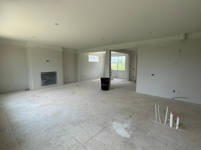 14538 Kingsview Ln N, Dayton, MN 55327 - unfurnished living room with a fireplace