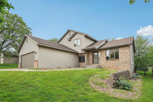 1504 Monarch St, Shakopee, MN 55379 - traditional-style house featuring brick siding, an attached garage, driveway, and a shingled roof