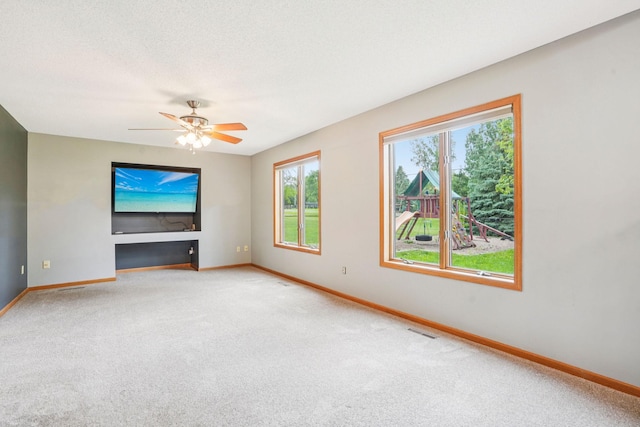 1504 Monarch St, Shakopee, MN 55379 - empty room with light colored carpet and a ceiling fan