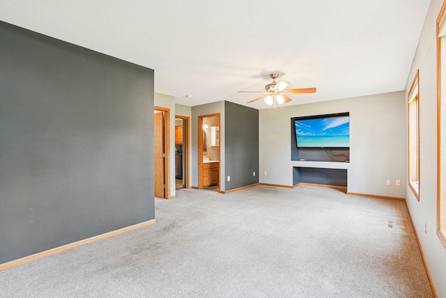 1504 Monarch St, Shakopee, MN 55379 - unfurnished bedroom with light carpet, connected bathroom, and ceiling fan