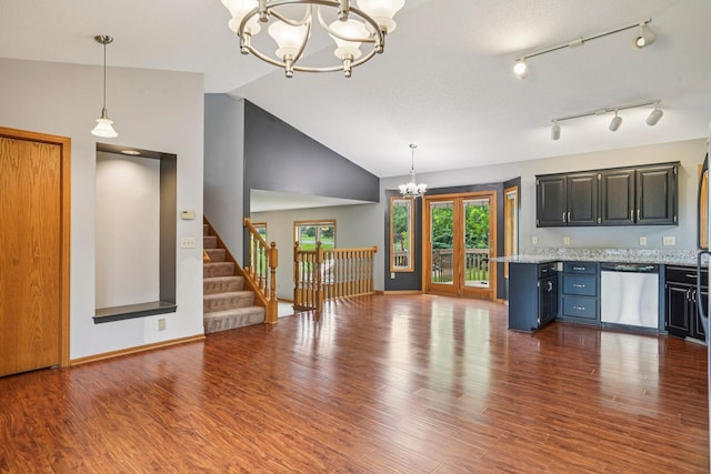 1504 Monarch St, Shakopee, MN 55379 - kitchen with dishwasher, a chandelier, lofted ceiling, wood finished floors, and pendant lighting