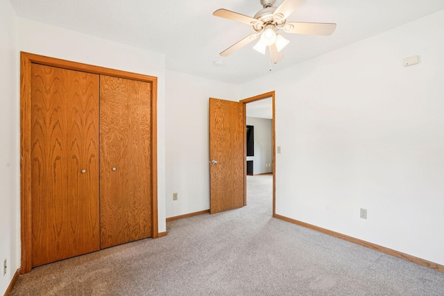 1504 Monarch St, Shakopee, MN 55379 - unfurnished bedroom with carpet flooring, a closet, and a ceiling fan