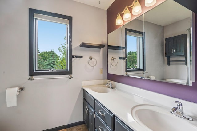 1504 Monarch St, Shakopee, MN 55379 - full bathroom featuring healthy amount of natural light and double vanity